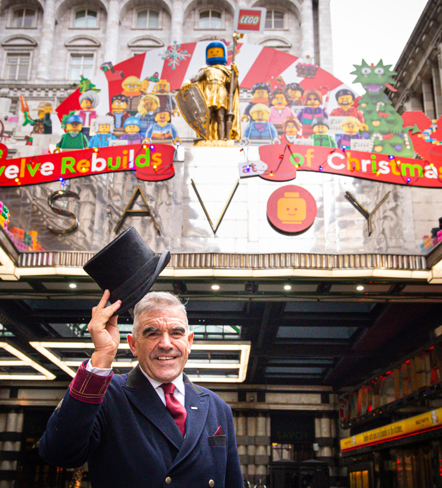 A man welcoming you to the entrance